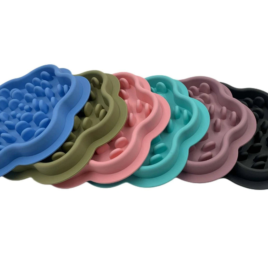Comedouros SlowBite em várias cores, empilhados