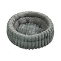 Cama CalmNest cinzenta, de pelúcia, com rebordo à volta